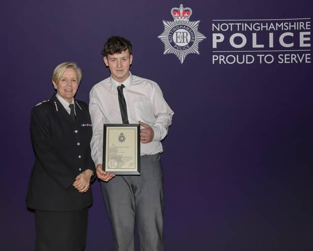 Chief Constable Kate Meynell with Harvey and his award