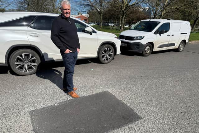 Ashfield MP Lee Anderson by one of the recent road repairs carried out by the council. Photo: Submitted