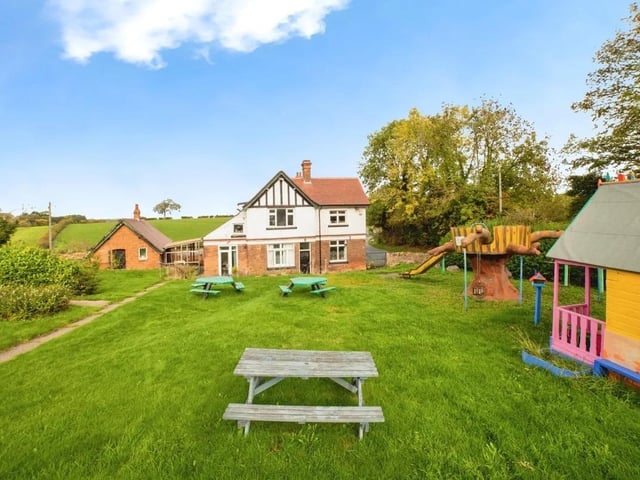 Formerly known as The Maypole Pub, this charming and expansive property offers a unique blend of character and potential, set within a generous plot of land.