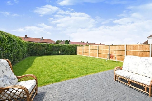 The back garden also features a paved seating area. Ideal for relaxing in the sun on a warm summer's day.