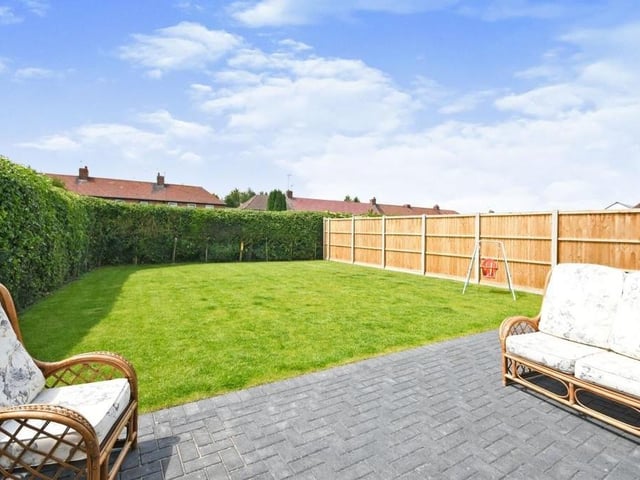 The back garden also features a paved seating area. Ideal for relaxing in the sun on a warm summer's day.