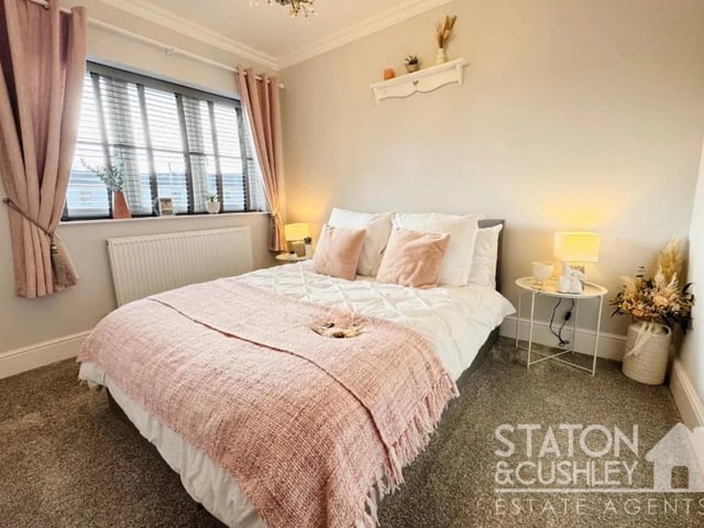 One of five spacious bedrooms in the property.