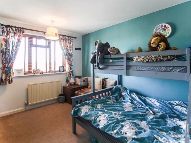 Bedroom number two, currently being used for the children, is also a good size. The floor is carpeted, and a double-glazed window faces the front of the South Normanton property.