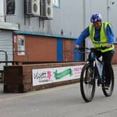 Gary Shaw, community manager of Mansfield Town Football in the Community, pedals to the One Call stadium.