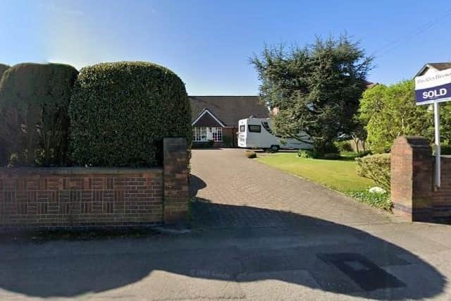 The property, valued at well over half a million pounds by estate agents, is set well back from the road. (PHOTO BY: Google Maps)