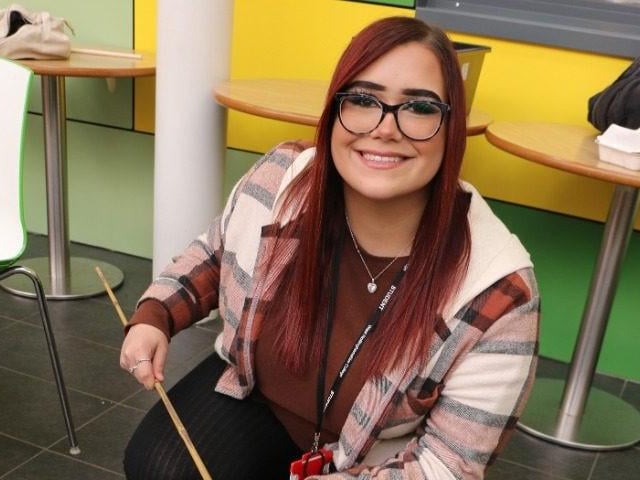 Demilee Flett helped customers to hook a duck.