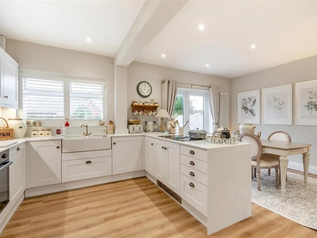 The bright open plan area is flooded with natural light thanks to a double glazed bay window to the front elevation, double glazed window to the rear elevation and French doors leading out onto the rear garden.