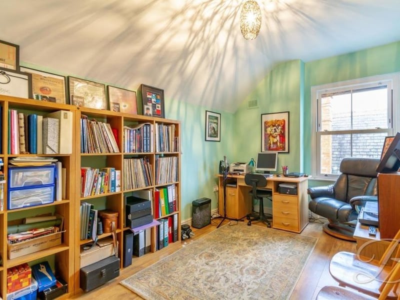 Two of the five double bedrooms at the £695,000-plus property can be found on the second floor, with windows to the side of the house. This one can be turned into a home office or study, and features an amazing amount of storage space.