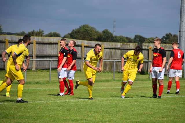 Ross Duggan celebrates a 35-yard worldie against Bridlington Town.