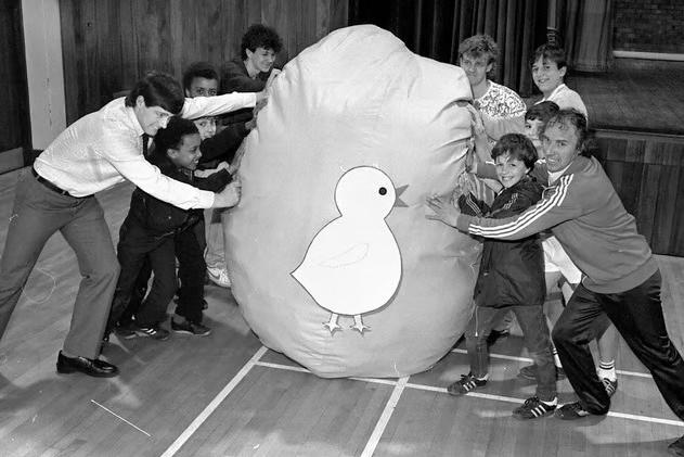 Kids and adults alike get to grips with a giant duck in Kirkby in 1970.