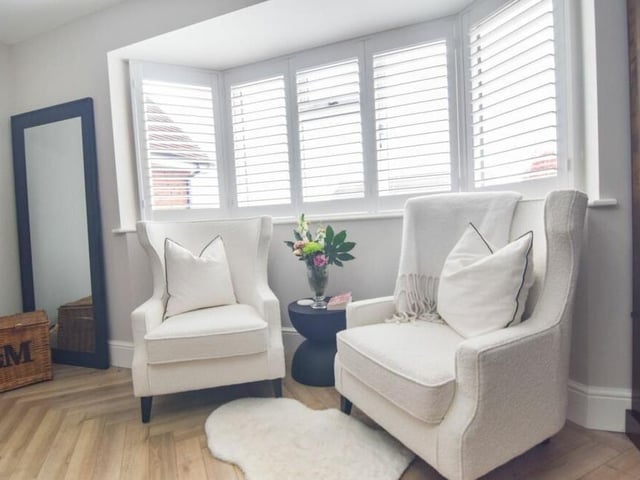 The study or playroom at the £575,000 property has a relaxing area by the front window.