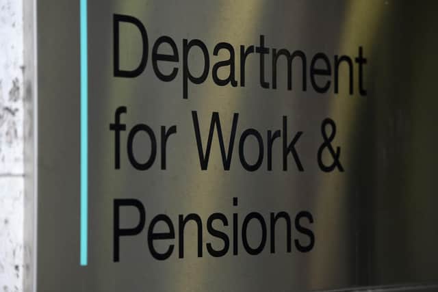 A view of signage for the Department of Work & Pensions in Westminster, London.