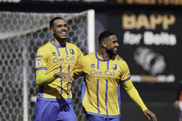 Mansfield Town midfielder Jon Russell and forward Tyler Roberts during the Sky Bet League 1 match against Luton Town FC, 18 Apr 2026, Photo credit Chris & Jeanette Holloway / The Bigger Picture.media