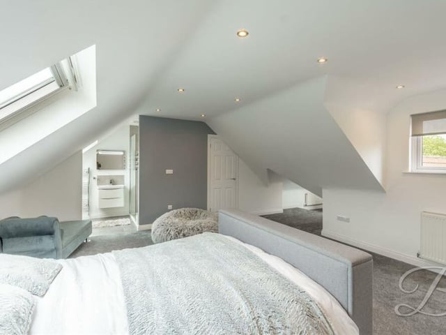 A second shot of the second bedroom on the first floor. As you can see, there is access to an en suite shower room.