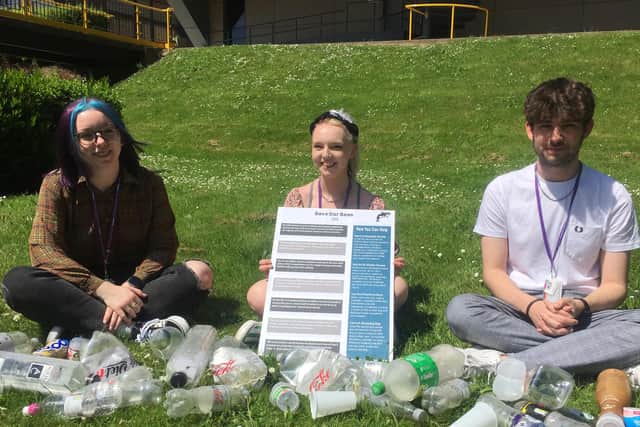 Jessica Jones, Jessica Combe and Connor Baugh with the poster about how to Save Our Seas