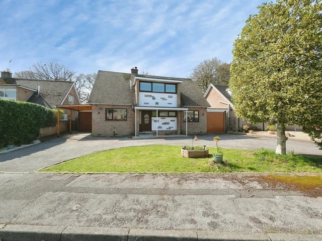 A beautifully modernised detached family home on Birch Grove, Berry Hill - Mansfield, offering bedrooms across both floors, a stunning kitchen/diner, conservatory, two garages and ample parking. Finished to a high standard throughout with landscaped gardens front and rear.
