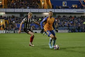 Mansfield Town are two points behind Salford in the last play-off place after last night-s draw with Grimsby.