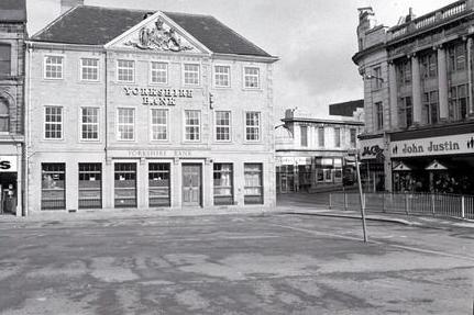Mansfield Market Place with the Yorkshire Bank in the background and John Justin's to the right back in 1977.