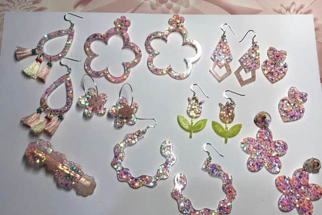 Some of Mae's glittery handmade earrings