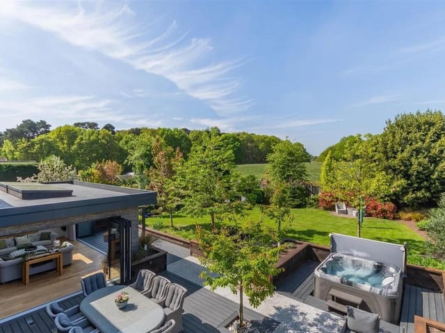 The stunning outdoor space features a range of entertaining areas with open rear views bordering to Berry Hill Park as well as a hot tub area with the hot tub included in the sale.