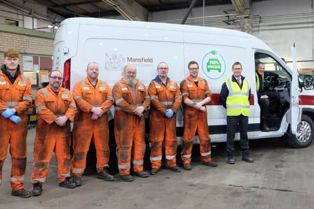 Andy Abrahams, Mansfield mayor, stood, right, with the van and some of Mansfield Council's fleet crew.