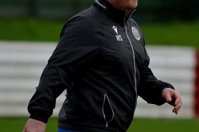 Sherwood manager Wayne Savage prepares for a game.