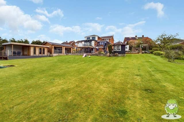 The full expanse of what's on offer at a six-bedroom property on Church Lane, Selston, viewed from the rear. It is on the market with estate agents Ewe Move for £995,000.