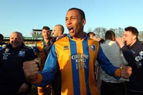 Matt Green celebrates Mansfield Town's promotion back to the EFL. (Photo by Ross Kinnaird/Getty Images)
