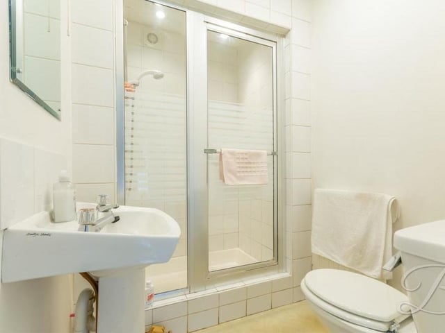 Squeezed between the first two bedrooms is this shower room, complete with an enclosed shower cubicle, hand wash basin and low-flush WC