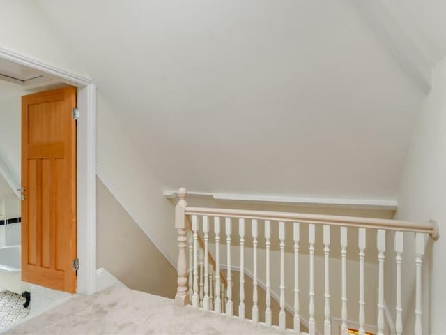 It's time now to move up to the second floor at the three-storey Crow Hill Drive property. This is the landing that leads to two more bedrooms and also the family bathroom.