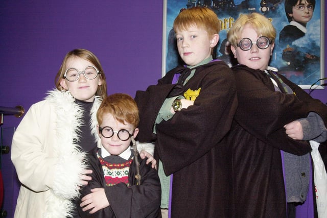 Laura, Patrick, and Matthew Greenhough dressed up as characters from Harry Potter as they saw a preview screening at UCG Cinemas with friend Lewis Sotham in 2001