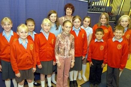 Adjudicator Marie Dixon pictured with youngsters who took part in one of the classes at the Music and Drama Festival.