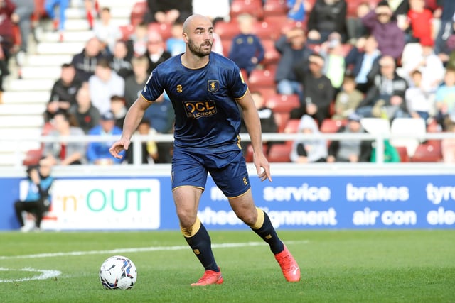 NORTHAMPTON, ENGLAND - OCTOBER 16: Farrend Rawson of Mansfield Town in action during the Sky Bet League Two match between Northampton Town and Mansfield Town at Sixfields Stadium on October 16, 2021 in Northampton, England. (Photo by Pete Norton/Getty Images)