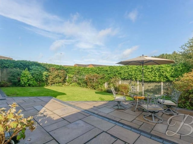 One of the back garden's main assets is this patio and delightful seating area. There is lots of room to host summer barbecues.