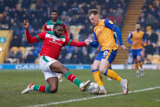 Ex-Stag Hayden White blocks the advancing George Maris. Photo by Chris Holloway / The Bigger Picture.media