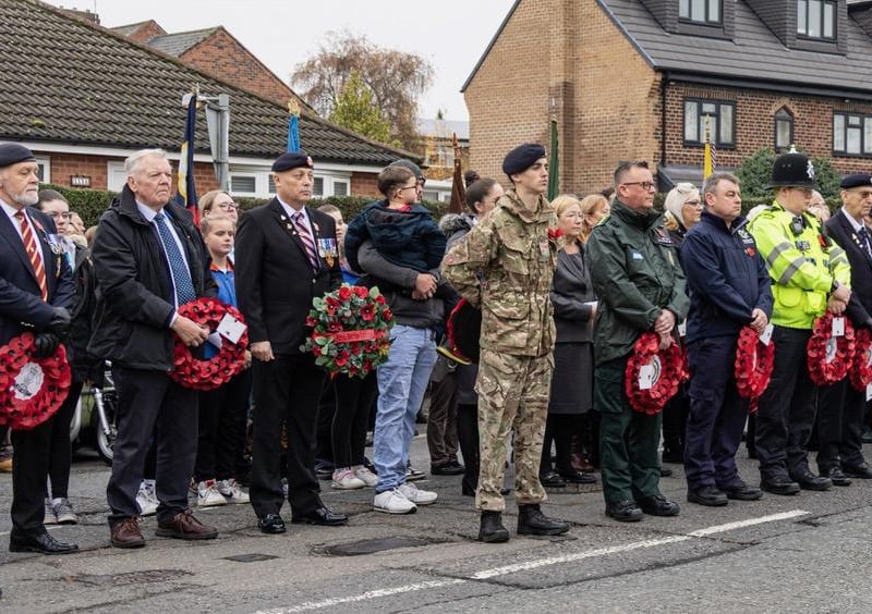 Wreath bearers ready to lay their wreaths at the Plumptre Way memorial in Eastwood.