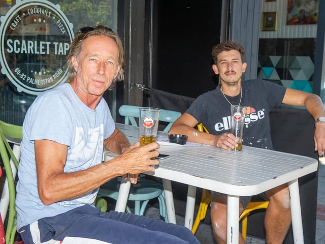 Steve Lewis and Mike Nunn enjoying a cold drink outside Scarlet Tap, Southsea. Picture: Habibur Rahman
