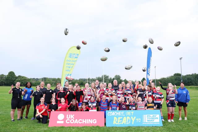 Maggie Alphonsi and girls involved in the session took part in a group photo at the end