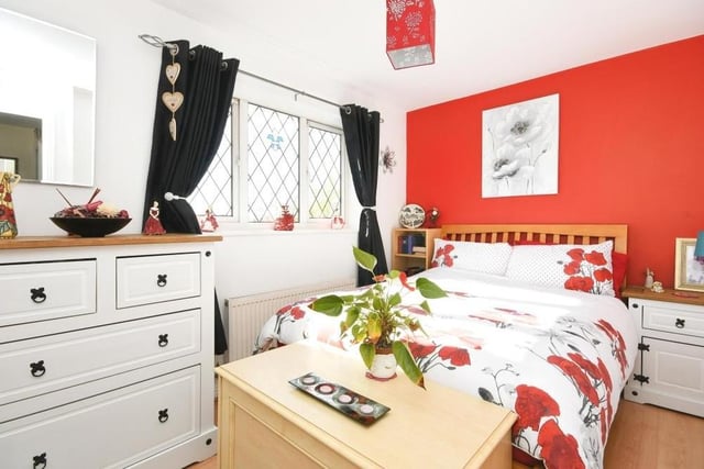Bedroom number two overlooks the back of the £290,000-plus property. Bright and colourful, it has lots of built-in storage, as well as space for a double bed.