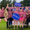 Icicles Junior celebrate after the Cancer Research Pretty Muddy race, including Mia Alexander, front centre in a pink tutu. (Photo by: Nottingham Synchronized Skating Academy)