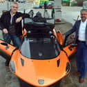 Europe's first flying car at Clipstone Road Service Station Mansfield. Andy Wall country manager UK PAL-V and Chairman DSK Nottingham Ltd Sivapalan Krishanand.