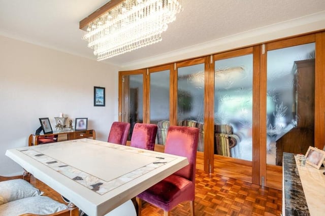 Behind the sliding doors is this delightful dining area.