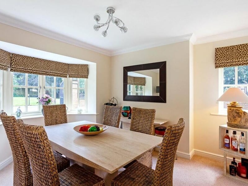 Next stop is this pleasant, dual-aspect dining room, which is distinguished by an imposing bay window that overlooks the front of the £695,000 house.
