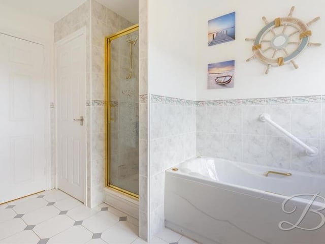 We couldn't resist a third look at the family bathroom - if only to show you the cutest of walk-in shower cubicles.