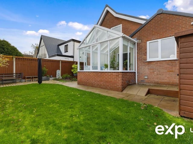 Secure gated side access leads into the rear garden, providing a delightful backdrop, with a patio being the ideal seating spot for al fresco dining and outdoor relaxation. The well-kept lawn with smartly edged borders sits within a secure fenced surround and is dotted with established planting.