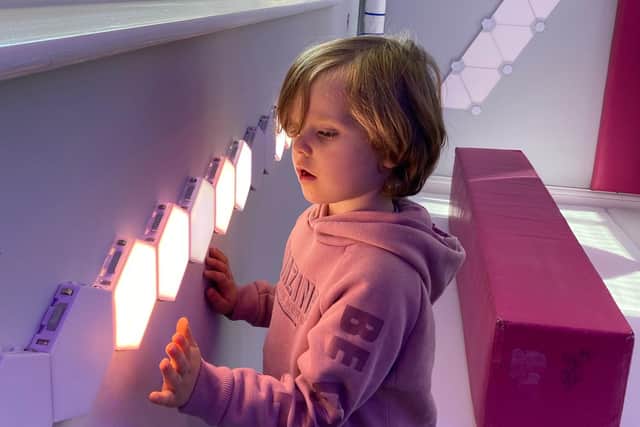 A child enjoying the play equipment at the new sensory centre.
