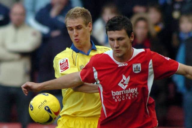 Tommy Wright, right, in action playing for Barnsley against Leeds United in 2006.