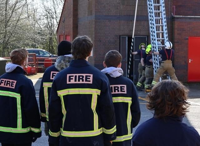 ATTFE Students watch and learn how a ladder is pitched at Ashfield Fire Station. Images Paul Horton