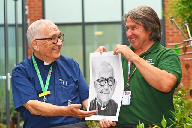 Richard Tatham, right, shows his image to trust chaplain Rodney Warden. Picture: Sherwood Forest Hospitals NHS Trust