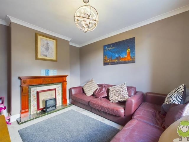 Here is the second lounge, or sitting room, at the £750,000 property. A nice space to relax in front of the fire.